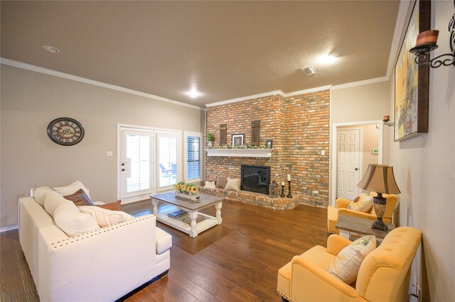 living room with brick wall, ornamental molding, and hardwood / wood-style floors