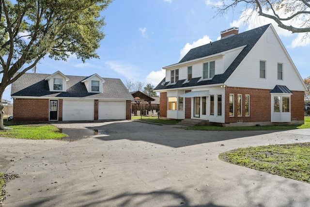 view of front of property featuring a garage