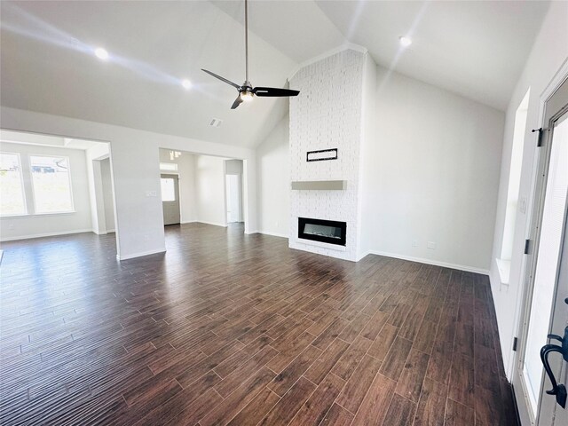 living room with ceiling fan, a fireplace, high vaulted ceiling, and dark hardwood / wood-style floors