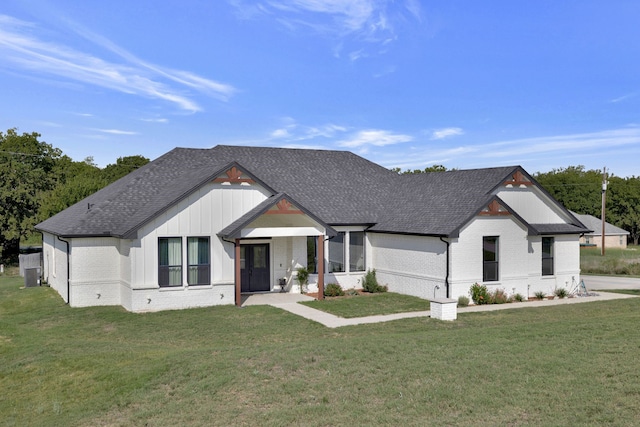 modern farmhouse with a front yard