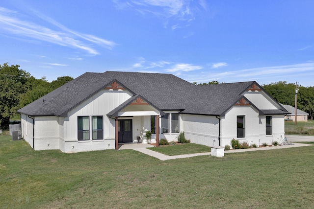 5564 Sheilagh Pl, Fort Worth, TX 76126 - modern inspired farmhouse with brick siding, a shingled roof, and a front lawn