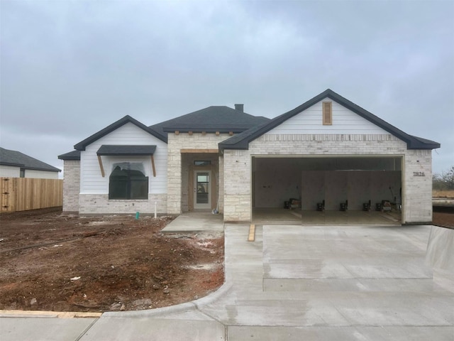 view of front of property featuring a garage