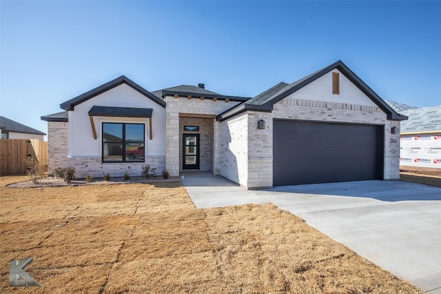 view of front of property featuring a garage