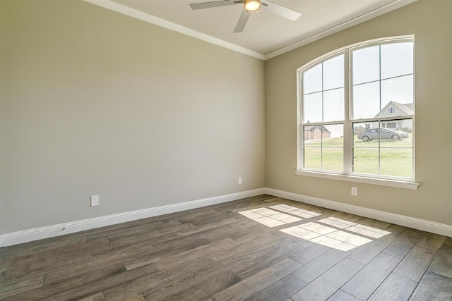 spare room featuring hardwood / wood-style floors, ceiling fan, and ornamental molding