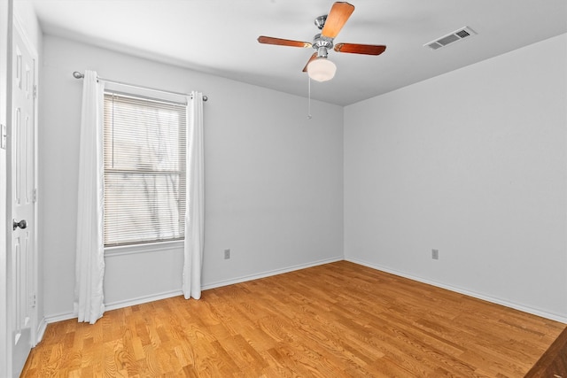 unfurnished room featuring ceiling fan and light hardwood / wood-style flooring