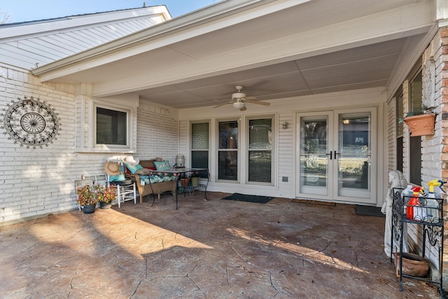 view of patio / terrace with ceiling fan and french doors