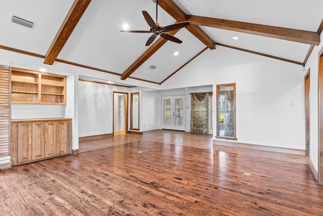 unfurnished living room featuring french doors, beamed ceiling, high vaulted ceiling, and hardwood / wood-style flooring