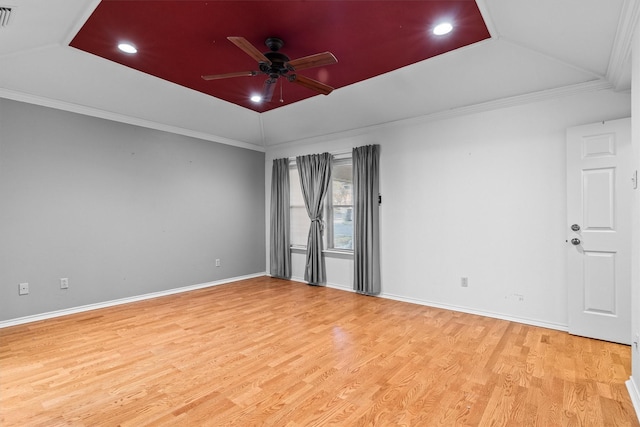 unfurnished room featuring crown molding, ceiling fan, and light wood-type flooring