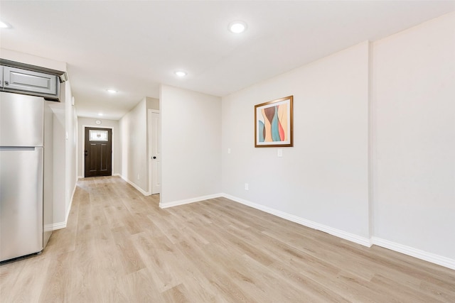 empty room with light wood-type flooring