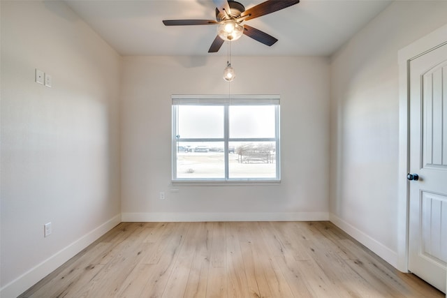 unfurnished room featuring ceiling fan and light wood-type flooring