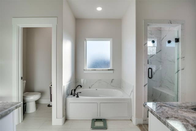 5223 Fox Trot Ln, Caddo Mills, TX 75135 - full bath with a garden tub, toilet, vanity, and a marble finish shower