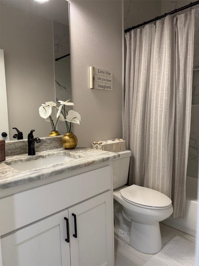 5223 Fox Trot Ln, Caddo Mills, TX 75135 - bathroom featuring vanity, a textured wall, shower / tub combo, toilet, and tile patterned flooring