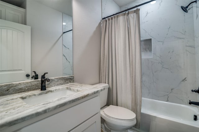 full bathroom featuring shower / tub combo with curtain, vanity, and toilet