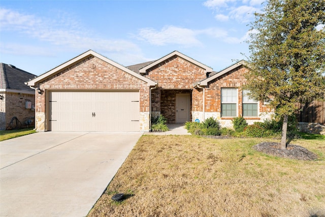 ranch-style house with a garage and a front lawn