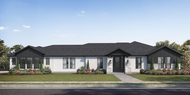 view of front of home with a front lawn