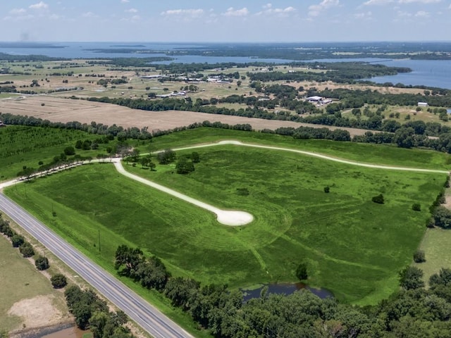 aerial view with a water view and a rural view