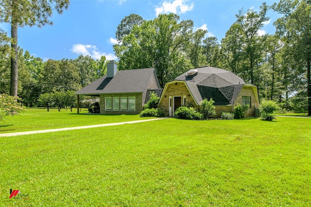 view of front of home with a front lawn