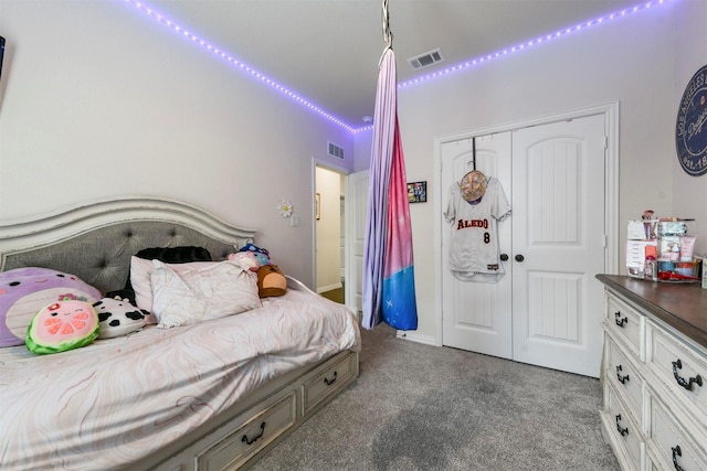 bedroom featuring a closet and carpet floors