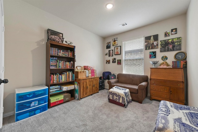 sitting room with light carpet