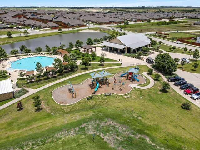 bird's eye view with a water view