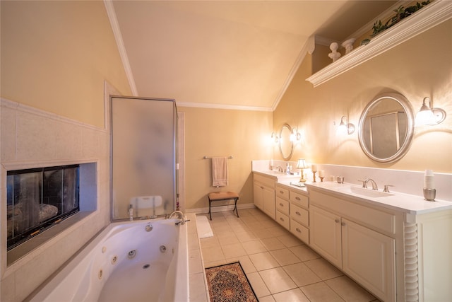 bathroom featuring ornamental molding, vanity, vaulted ceiling, plus walk in shower, and tile patterned flooring