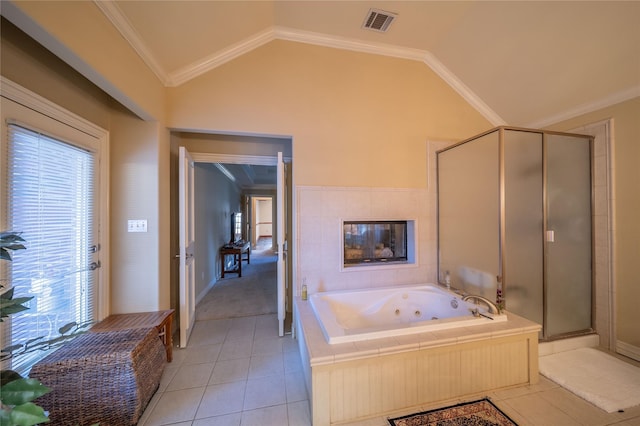 bathroom featuring tile patterned flooring, independent shower and bath, vaulted ceiling, and ornamental molding