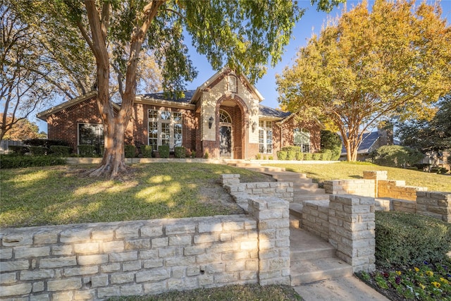 view of front of home with a front yard