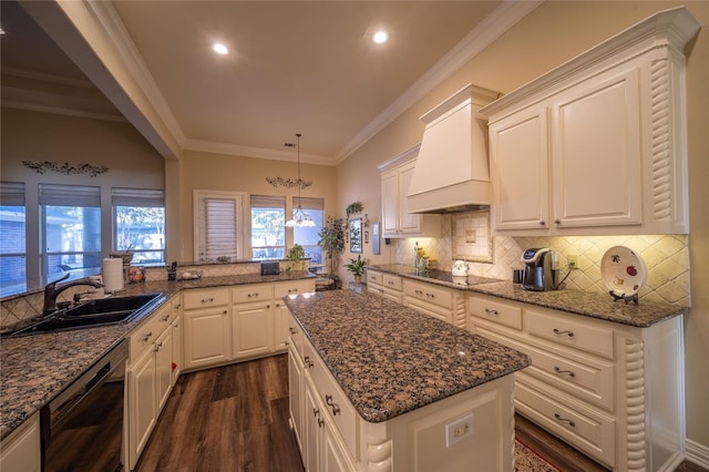 kitchen with sink, premium range hood, kitchen peninsula, black appliances, and ornamental molding