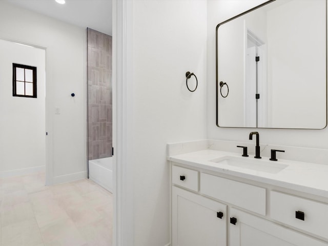 bathroom featuring vanity and shower / bathtub combination