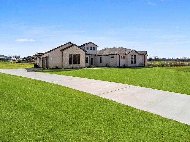 view of front of home with a front lawn