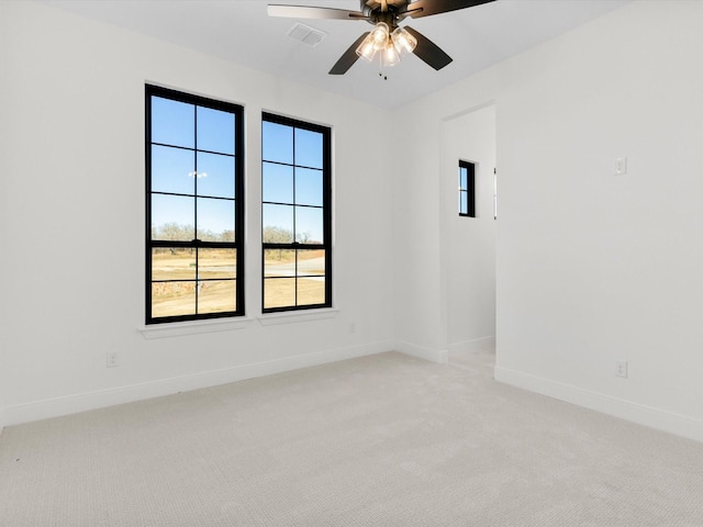 unfurnished room with carpet floors and ceiling fan