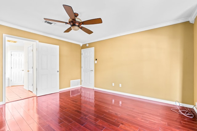 unfurnished room featuring wood-type flooring, ceiling fan, and crown molding