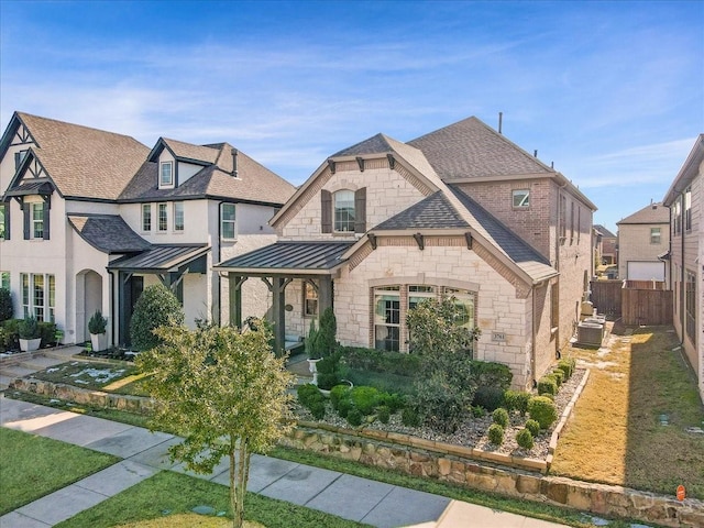 french country style house featuring central AC