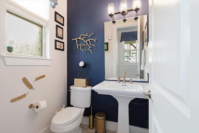 bathroom featuring toilet and sink