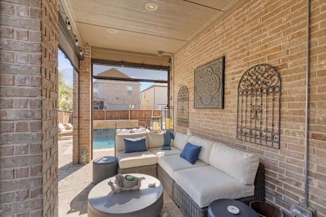 view of patio featuring an outdoor hangout area and a fenced in pool