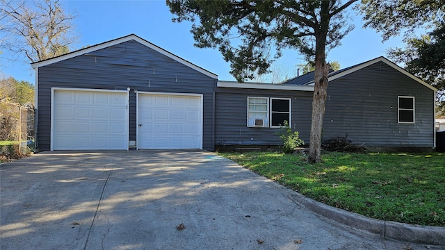 ranch-style home with a garage