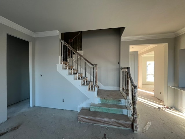 stairs featuring ornamental molding