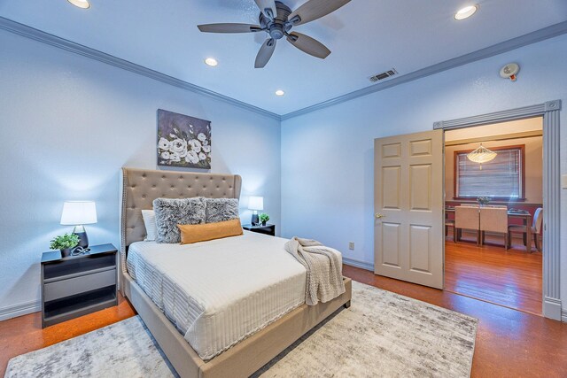 bedroom with ceiling fan, hardwood / wood-style flooring, and ornamental molding