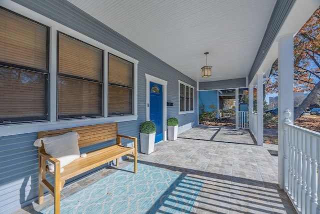 view of patio featuring a porch