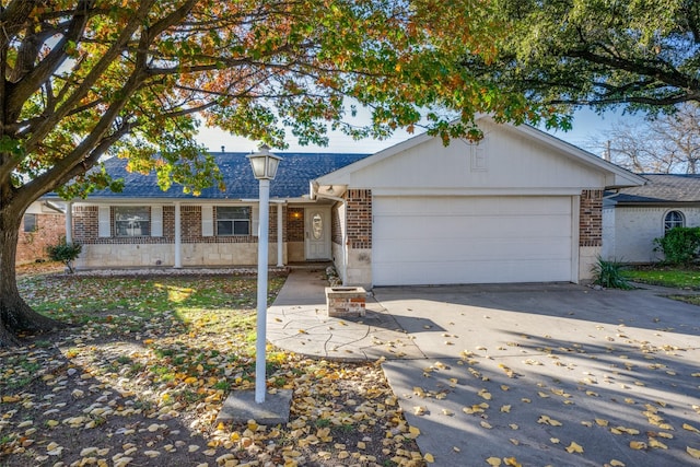 ranch-style house featuring a garage