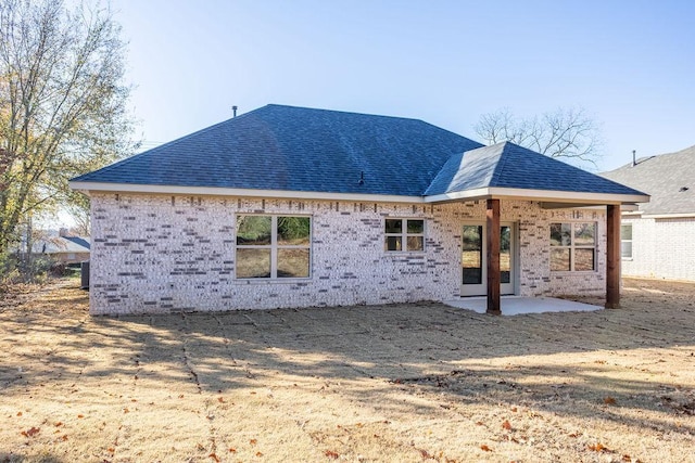 rear view of house featuring a patio