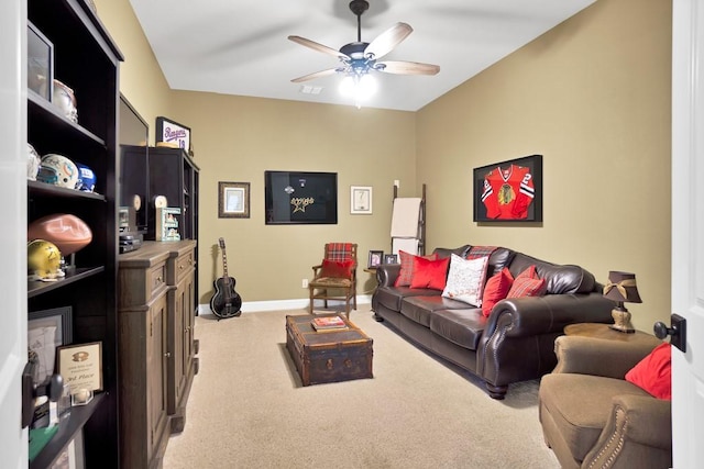carpeted living room with ceiling fan, visible vents, and baseboards