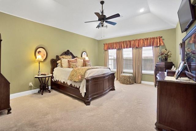 bedroom with light colored carpet, recessed lighting, and baseboards