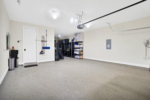 garage with baseboards, a garage door opener, and electric panel