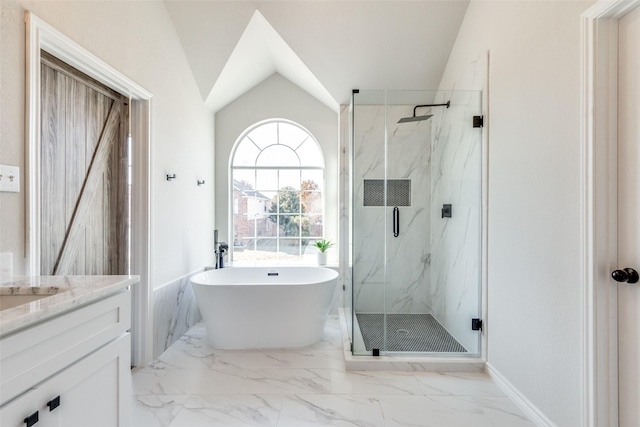 bathroom with separate shower and tub, vanity, and vaulted ceiling