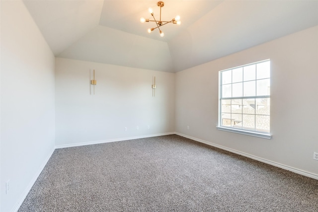 unfurnished room with vaulted ceiling, carpet floors, and a chandelier