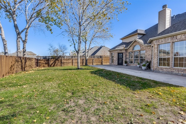 view of yard with a patio area