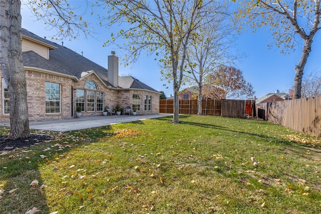 view of yard with a patio