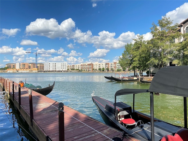 view of dock with a water view