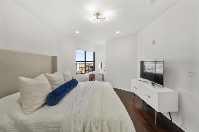 bedroom featuring dark wood-type flooring